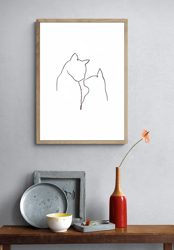 Постер «Линии - Кошечки» на стене в офисе