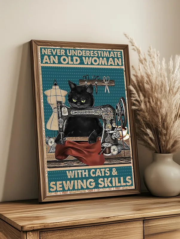 Постер «Кот портной» на стене в офисе