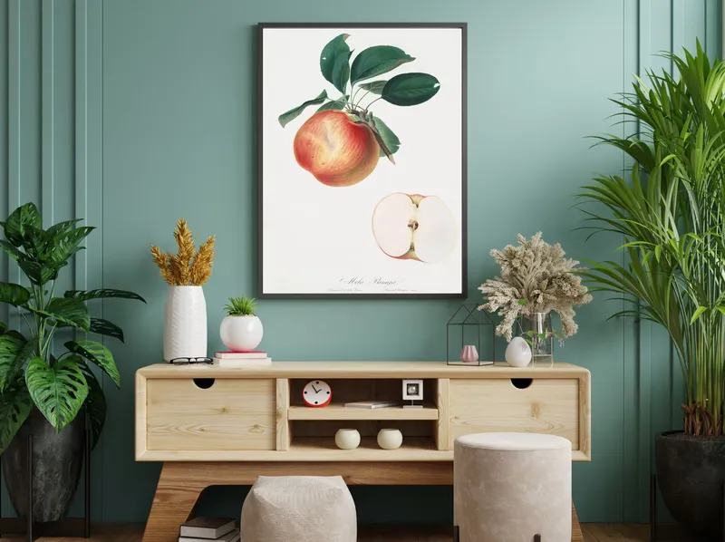 Постер «Фрукты - Красное яблоко» над диваном в гостиной