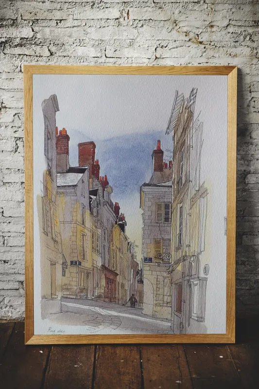 Постер «Старый город» над диваном в гостиной