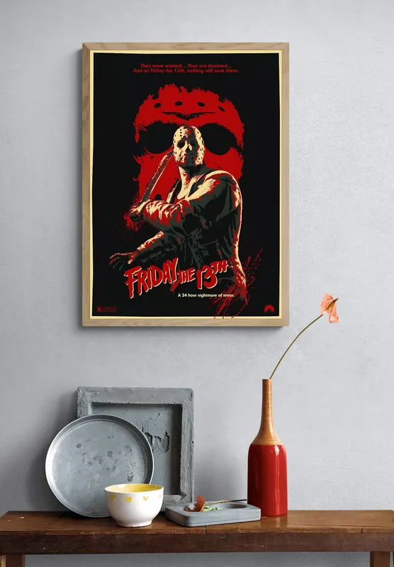 Постер «Пятница 13» на стене в офисе