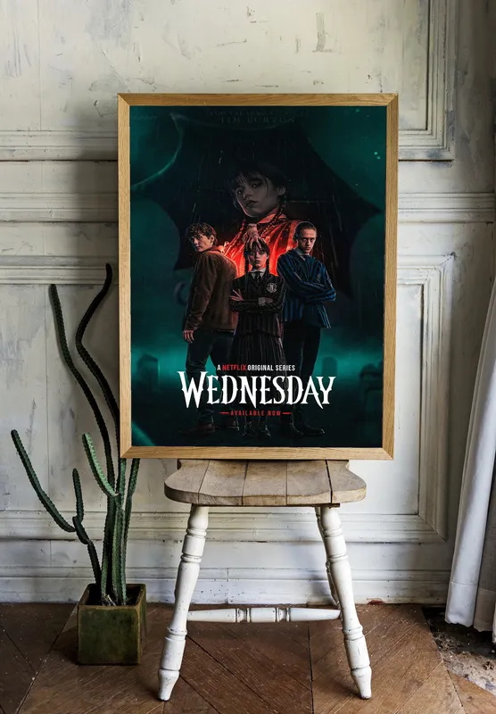 Постер «Wednesday. Тайлер и Ксавье Торп» на стене в офисе