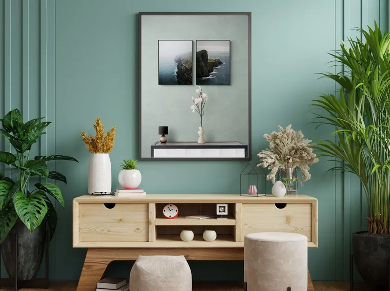 Постер «Набор постеров Скалы в море» над диваном в гостиной