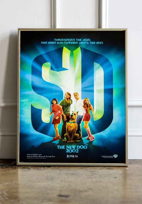 Постер «Скуби-ду» на стене в офисе