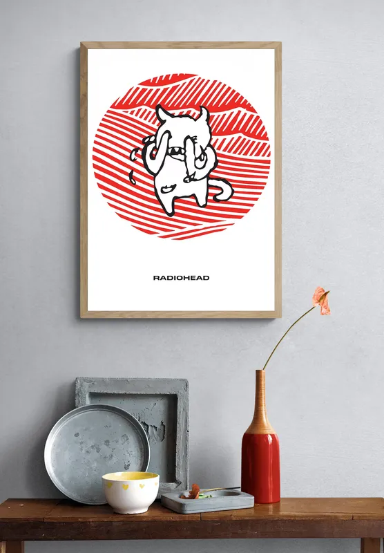 Постер «Radiohead - Amnesiac» на стене в офисе