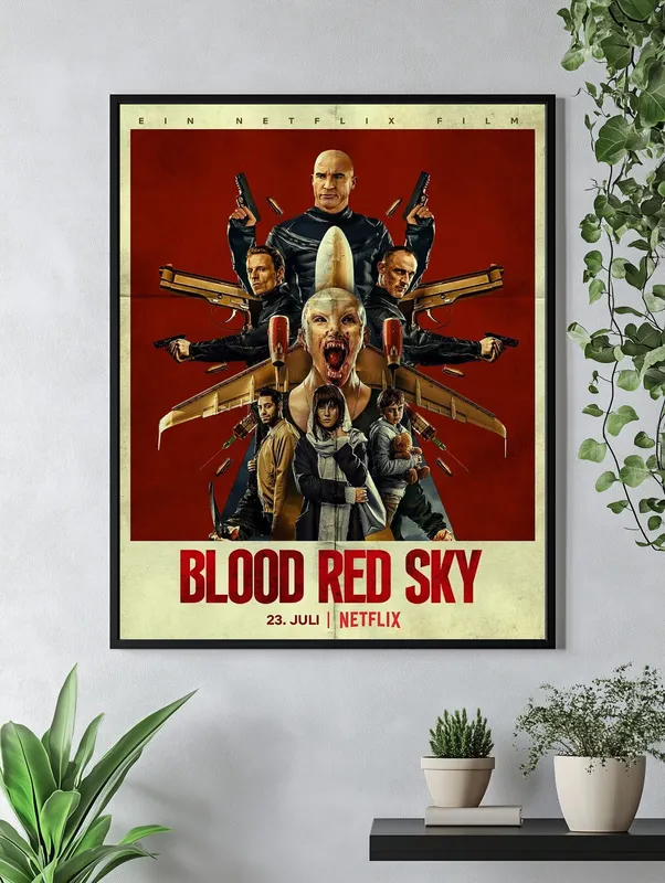 Постер «Кроваво красное небо» на стене в офисе