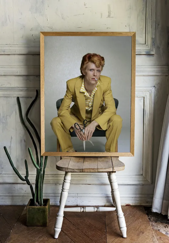 Постер «Дэвид Боуи» на стене в офисе