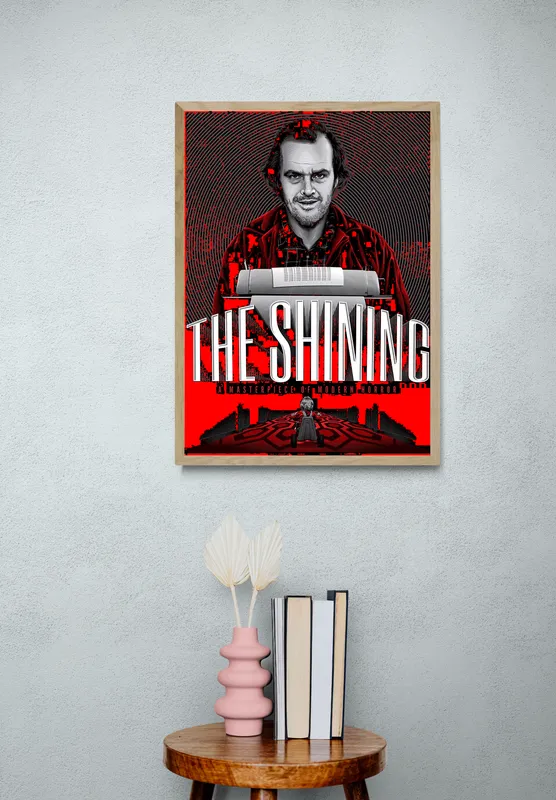 Постер «Сияние» на стене в офисе