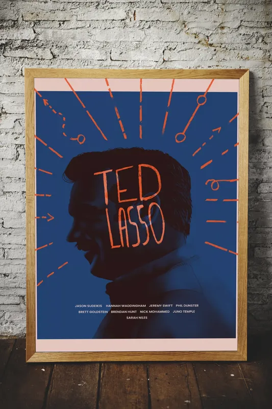 Постер «Знаменитый тренер - Тед Лассо» на стене в офисе