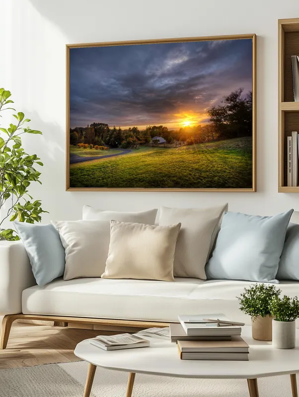 Постер «Рассвет над селом» над диваном в гостиной