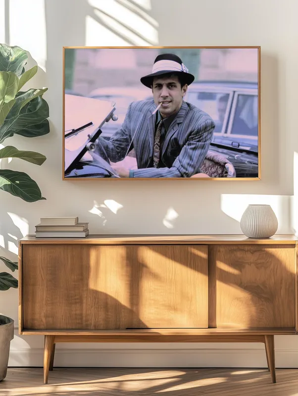 Постер «Адриано Челентано в авто» на стене в офисе